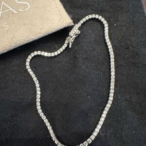 Adinas Jewels Classic thin tennis bracelet in  Silver.   7 inch